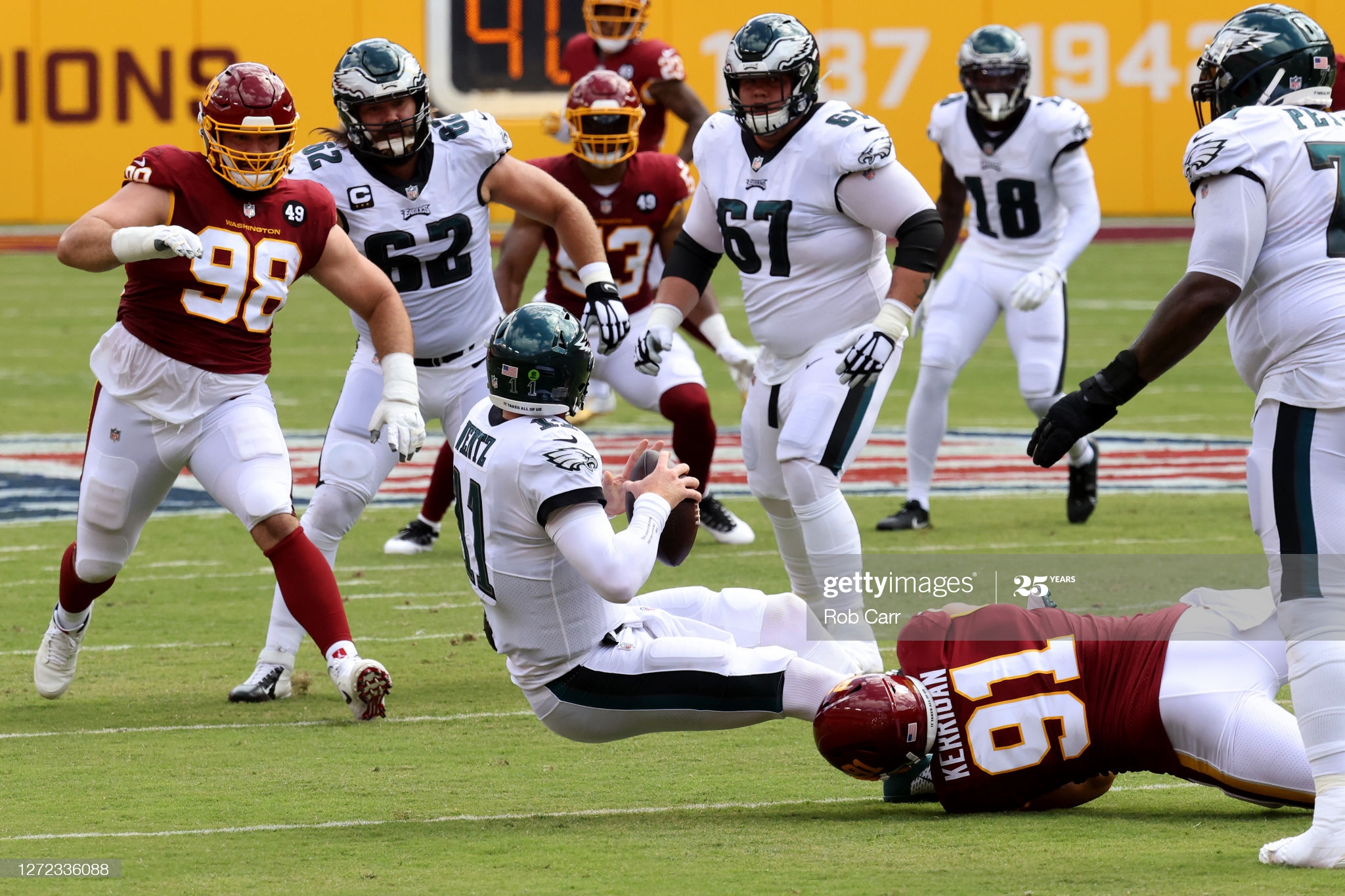 Philadelphia Eagles' Carson Wentz swaps jerseys after Ryan Kerrigan  destroys his first one 